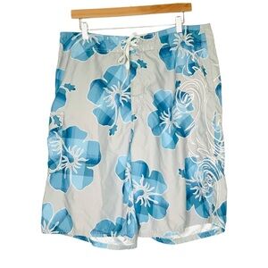 The Kirra Men’s Blue White Hawaiian Print
Boardshorts Men's Size 34 Swim Trunks